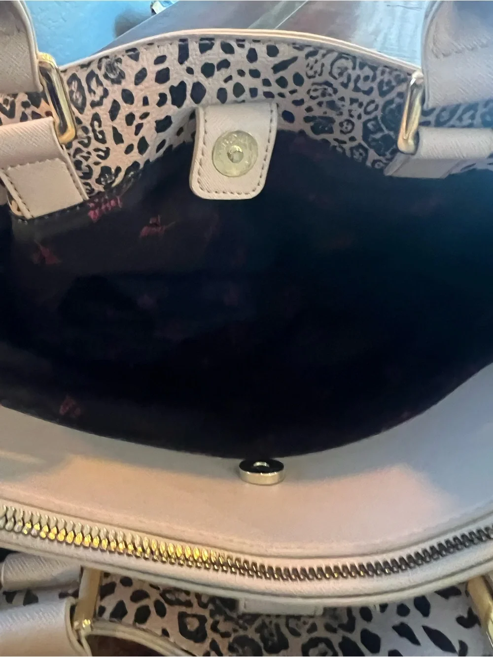 Betsey Johnson satchel handbag featuring an embossed heart pattern
